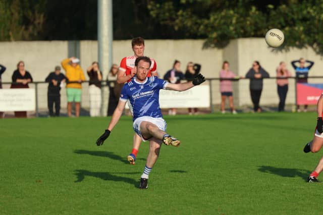 Tommy Dillane fires over a two-pointer during Rathkeale's victory over Mungret in the Limerick Senior Football Championship