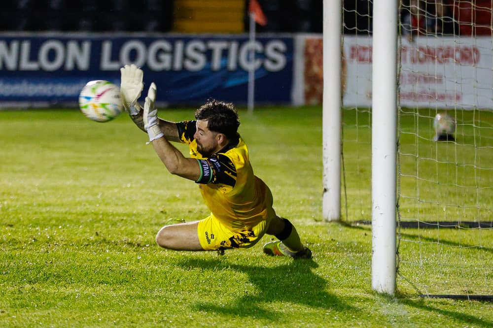 Treaty United keeper Jack Brady saves an Aaron Doran penalty during their 2-0 away win against Longford Town