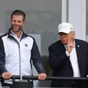 Donald Trump with son Eric (left)