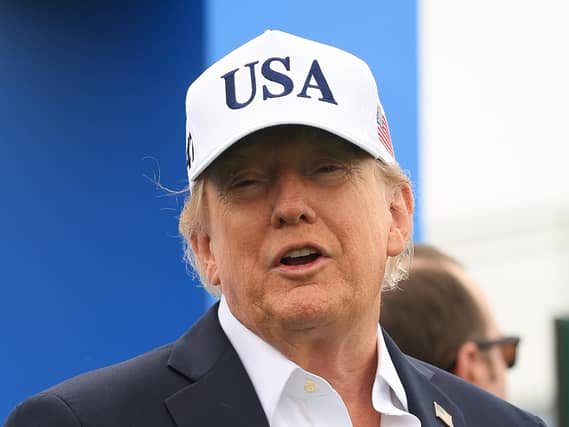 President Donald Trump in a USA baseball cap