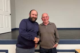 Gareth Enright passing the torch to Dan 'Budgie' O' Brien, Broadford's new postman