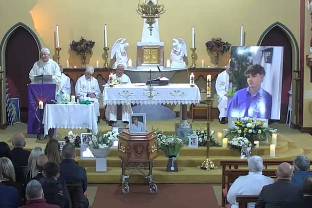 A number of photos of the late Rory O’Connor adorned the altar of St Bartholomew’s Church in Athea