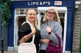 Designer Iryna Ilina-Rumiantseva with owner of Lips & P's, Newcastle West, Siv Moltu-Jacobsen, showing two of the bags Iryna designed 