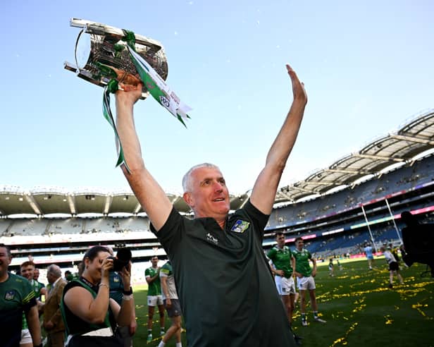 Limerick manager John Kiely celebrates with the Liam MacCarthy Cup after the GAA Hurling All-Ireland Senior Championship win over Galway