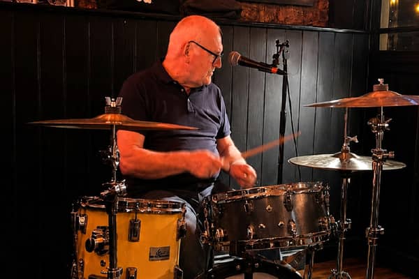 Guido Divito at work on the drum kit photo by Kieran Beville