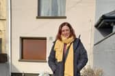 Cllr Sarah Beasley, pictured outside a boarded up home