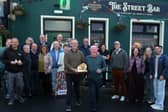 Owners of The Street Bar in Kilteely, locals and representatives of Publicis and Heineken celebrate prizes won by the short film The Pub That Refused To Die