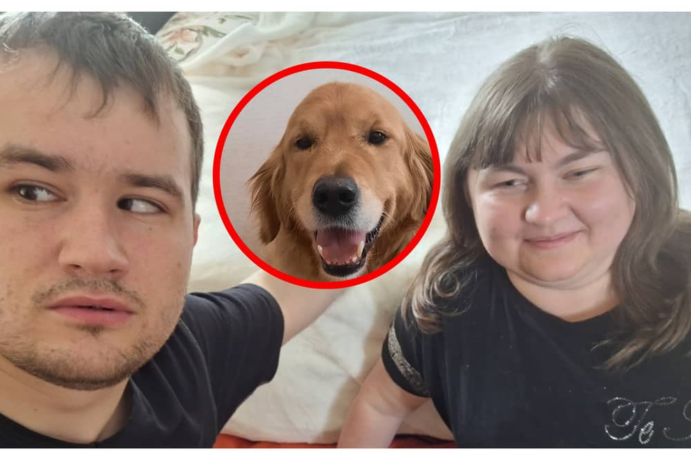 Ukrainian refugees Pavlo Romaniuk, 31, and Yuliia Nahaiets, 30, with their faithful guide dog Amigo.