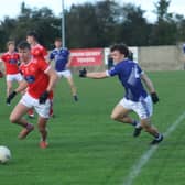 Shane Barry of Mungret St Paul’s and Cian O'Sullivan of Kildimo-Pallaskenry contesting for the ball in the Irish Wire Products SFC semi-final