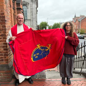 ​Canon Derek Leonard with Limerick School of Art and Design student Gabriele Bosella, and the vestment he created | PICTURE: SHEILA CURTIN
