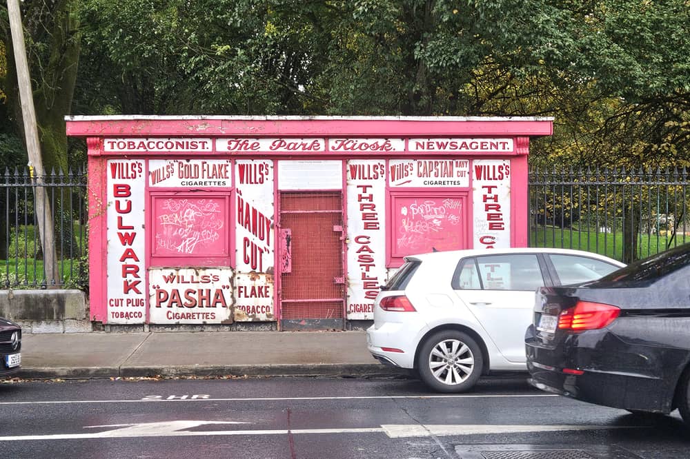 The historic kiosk, with its striking red and white facade, is an iconic landmark in Limerick city