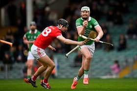 Robbie Egan of Kilmallock is tackled by Ben Hayes of Monaleen during the county semi-final
