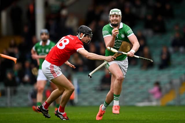 Robbie Egan of Kilmallock is tackled by Ben Hayes of Monaleen during the county semi-final