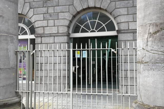 Some of the childrens' shoes left at the gates of the Merchant's Quay courthouse in Limerick city centre