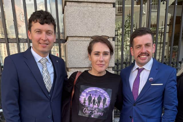 Trish Horrigan-Lehane, flanked by Aontu TD Paul Lawless and Labour TD, Limerick's Conor Sheehan