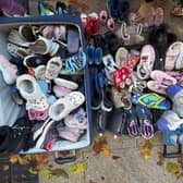 Powerful image: Campaigners with the Walk in our Shoes campaign left dozens of tiny children’s shoes outside Leinster House, to symbolise the childhoods that campaigners believe are being lost or damaged as a result of decisions made in Ireland’s Family Courts. For safety and confidentiality reasons, a decision was taken not to photograph those who descended on Leinster House.