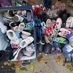 Powerful image: Campaigners with the Walk in our Shoes campaign left dozens of tiny children’s shoes outside Leinster House, to symbolise the childhoods that campaigners believe are being lost or damaged as a result of decisions made in Ireland’s Family Courts. For safety and confidentiality reasons, a decision was taken not to photograph those who descended on Leinster House.