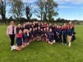 The Mhodh Scoil girls team that won the City A Football Shield