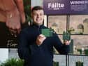 Seán Leddin, founder of Fíor Jewellery, celebrating Fíor being named the winner of Carrolls Irish Gifts' Fáilte 2026 initiative at the brand's College Green store in Dublin