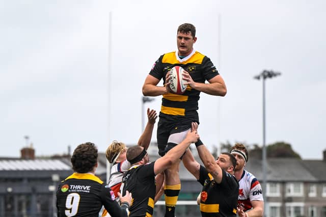 Young Munster's Evan O'Connell wins a lineout during their defeat to Old Wesley in Round 4 of the All-Ireland League Division 1A
