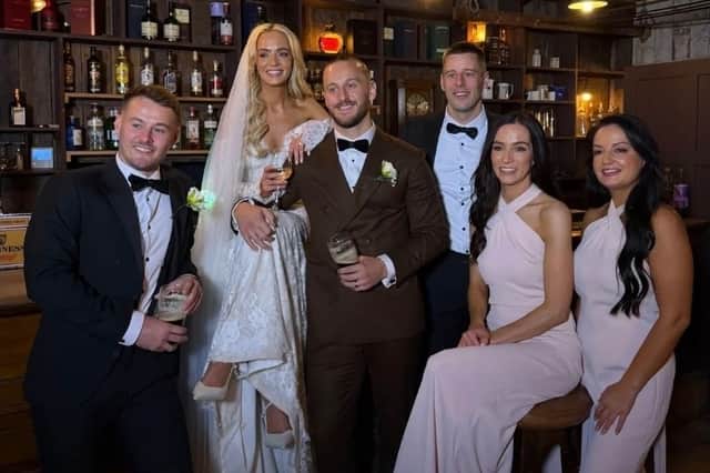The wedding party enjoying the popular couple's big day
