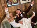 Tom Morrissey and bride Elaine Dolan toast their nuptials