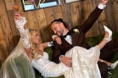 Tom Morrissey and bride Elaine Dolan toast their nuptials