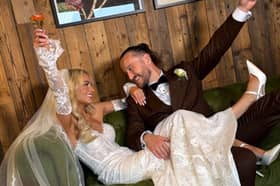 Tom Morrissey and bride Elaine Dolan toast their nuptials