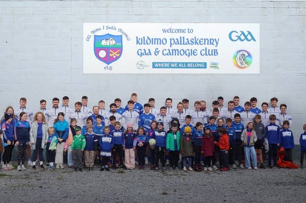 Young Kildimo-Pallaskenry supporters with the team