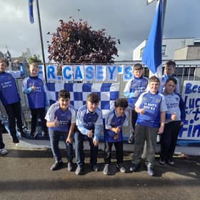 The boys of St Mary's National School supporting Fr Casey's