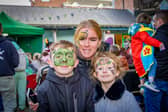 The Payne family, Laura, Michael aged 10 and Laura aged 8 having fun at the Harvest Fair in the Milk Market