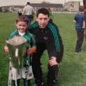 Graeme Mulcahy with a young Jackie Dwane after Kilmallock won the Limerick SHC in 2014. The pair played in last Sunday's victory over Na Piarsaigh at the TUS Gaelic Grounds