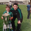 Graeme Mulcahy with a young Jackie Dwane after Kilmallock won the Limerick SHC in 2014. The pair played in last Sunday's victory over Na Piarsaigh at the TUS Gaelic Grounds