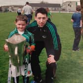 Graeme Mulcahy with a young Jackie Dwane after Kilmallock won the Limerick SHC in 2014. The pair played in last Sunday's victory over Na Piarsaigh at the TUS Gaelic Grounds