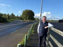 Cllr Dan McSweeney stands on the site of the proposed bus shelter in Clarina