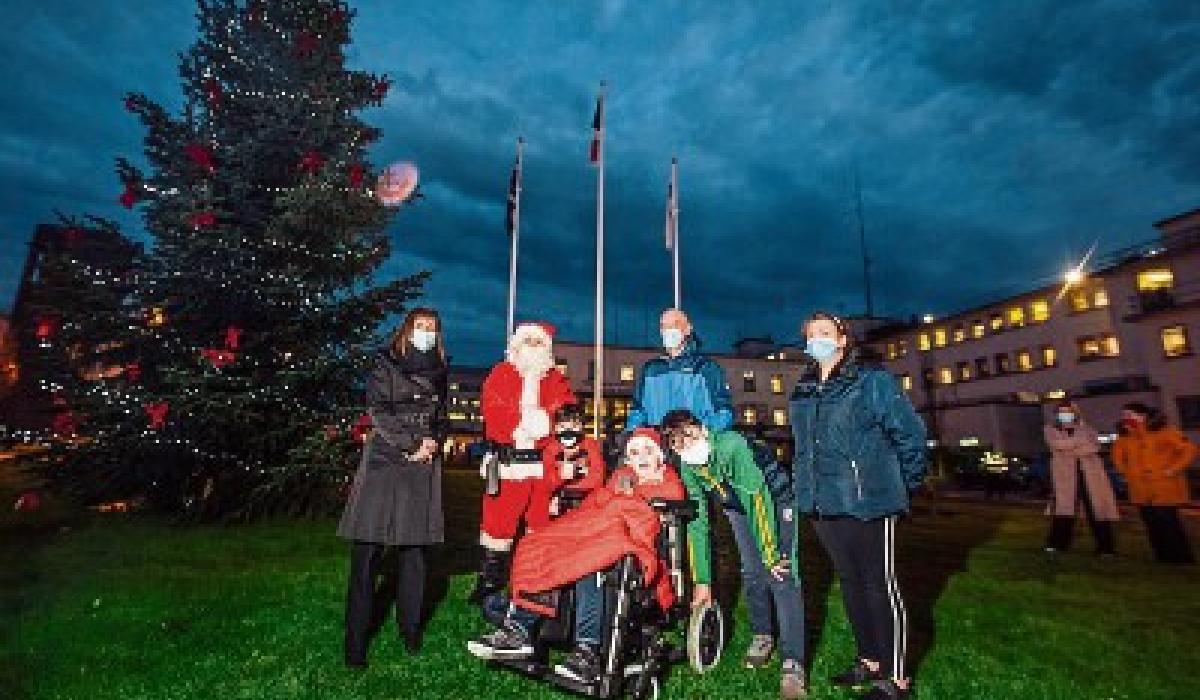 Courageous Dáithí lights up Christmas tree at University Hospital