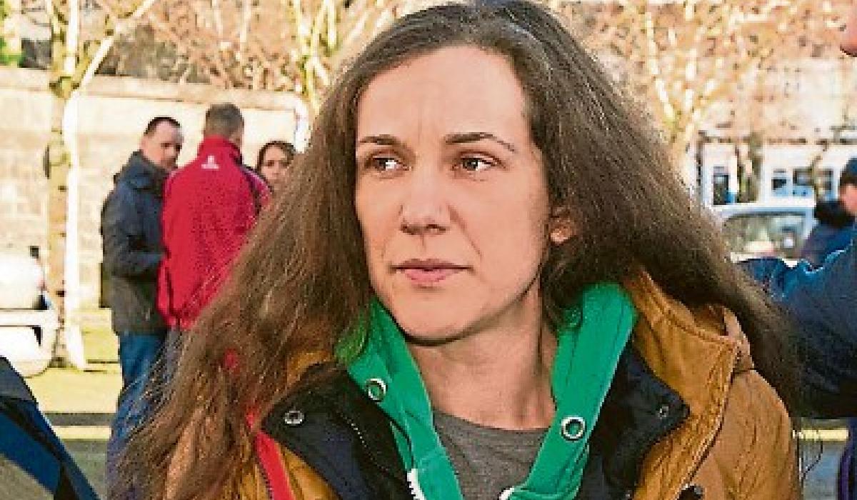 Body of marathon runner was found 'wrapped in plastic' at rear of house