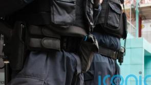 22-year-old arrested after slashing NI police officer's face and stabbing another's neck