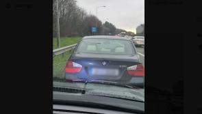 Motorist arrested after being caught ‘whizzing’ up a bus lane 