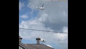 "It's a bird! It's a plane!" It’s an aeroplane being transported over Limerick by helicopter