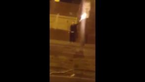 WATCH: Man sets referendum poster on fire in Limerick city