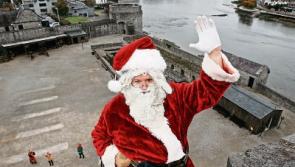 Santa ‘drops in’ over the walls of King John's Castle in Limerick for a festive visit