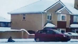 WATCH: Snow joke as Dad put off road for towing sleigh with car in County Limerick