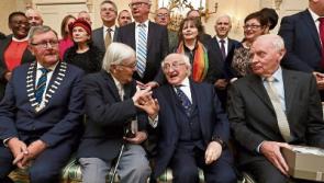 President honours high profile peace committee at Aras