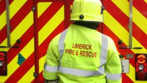 Emergency services attending the scene of a truck crash in Limerick