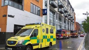 Emergency services at scene of car collision in Limerick city