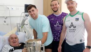 Hurling heroes pay surprise hospital visit to fan who fell off ladder trying to put up flag