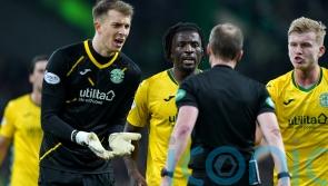 Hibernian sign defender Rocky Bushiri on permanent contract from Norwich