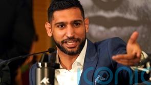 Three men charged after boxer Amir Khan ‘robbed at gunpoint’