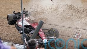 Zhou Guanyu’s Alfa Romeo overturns in first-lap crash at British Grand Prix